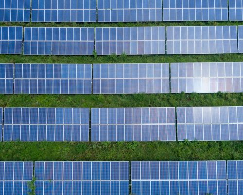 Aerial shot of a solar panel array generating renewable energy in Trenton, Georgia.